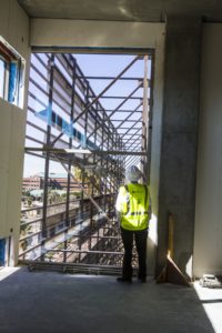 Jeff Ehret looking at the building while it was under construction
